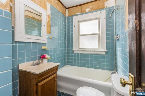 a bathroom with a sink and a bathtub