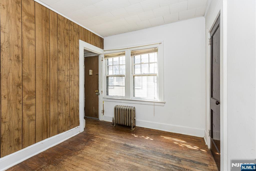 734 Broad Street Bloomfield, NJ 07003 - Photo 15 of 23 a view of a livingroom with an entryway