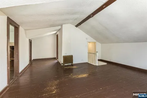 a view of empty room with windows
