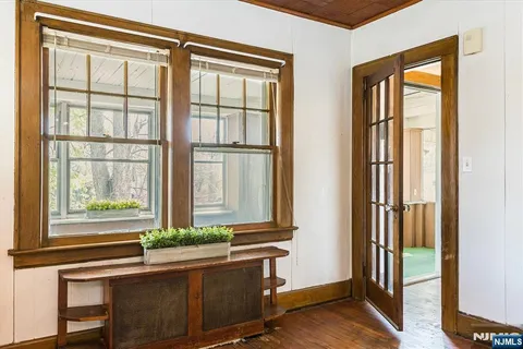 a room with window and stairs