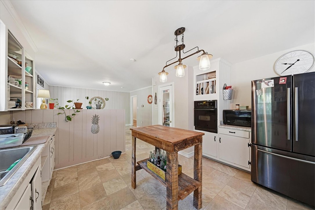 504 Jeb Stuart Avenue Anderson, SC 29621 - Photo 15 of 47 This spacious kitchen offers ample room for culinary creativity and gatherings.