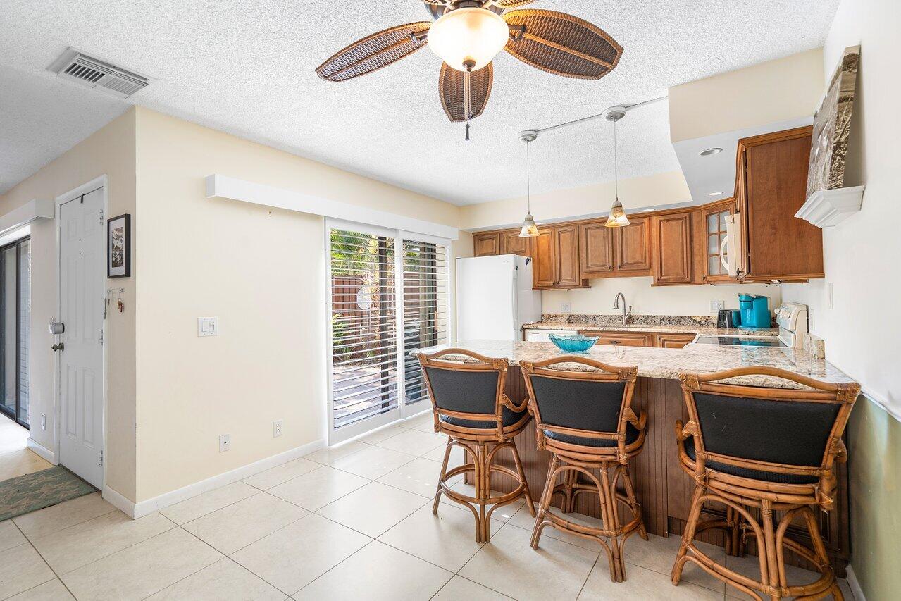 103 Ocean Cove Drive Jupiter, FL 33477 - Photo 3 of 21 008-103OceanCoveDrive-Jupiter-FL-33477-S