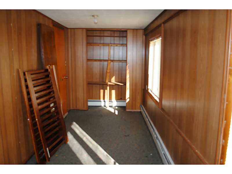 1294 Butler Road Springdale, PA 15144 - Photo 17 of 25 Sunroom. Utility Room, Office, 4th Bedroom...Rear View