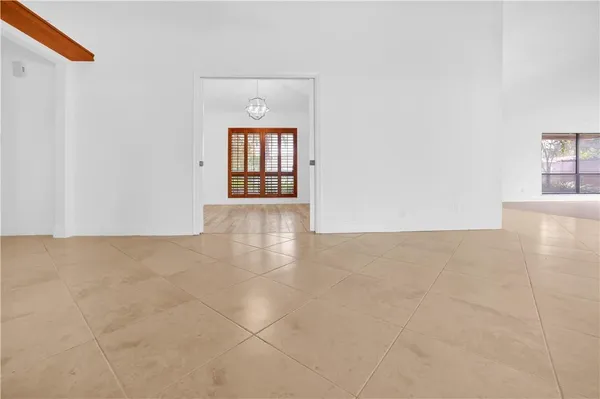 a view of an empty room and window