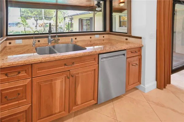 a view of a bathroom with a sink and mirror