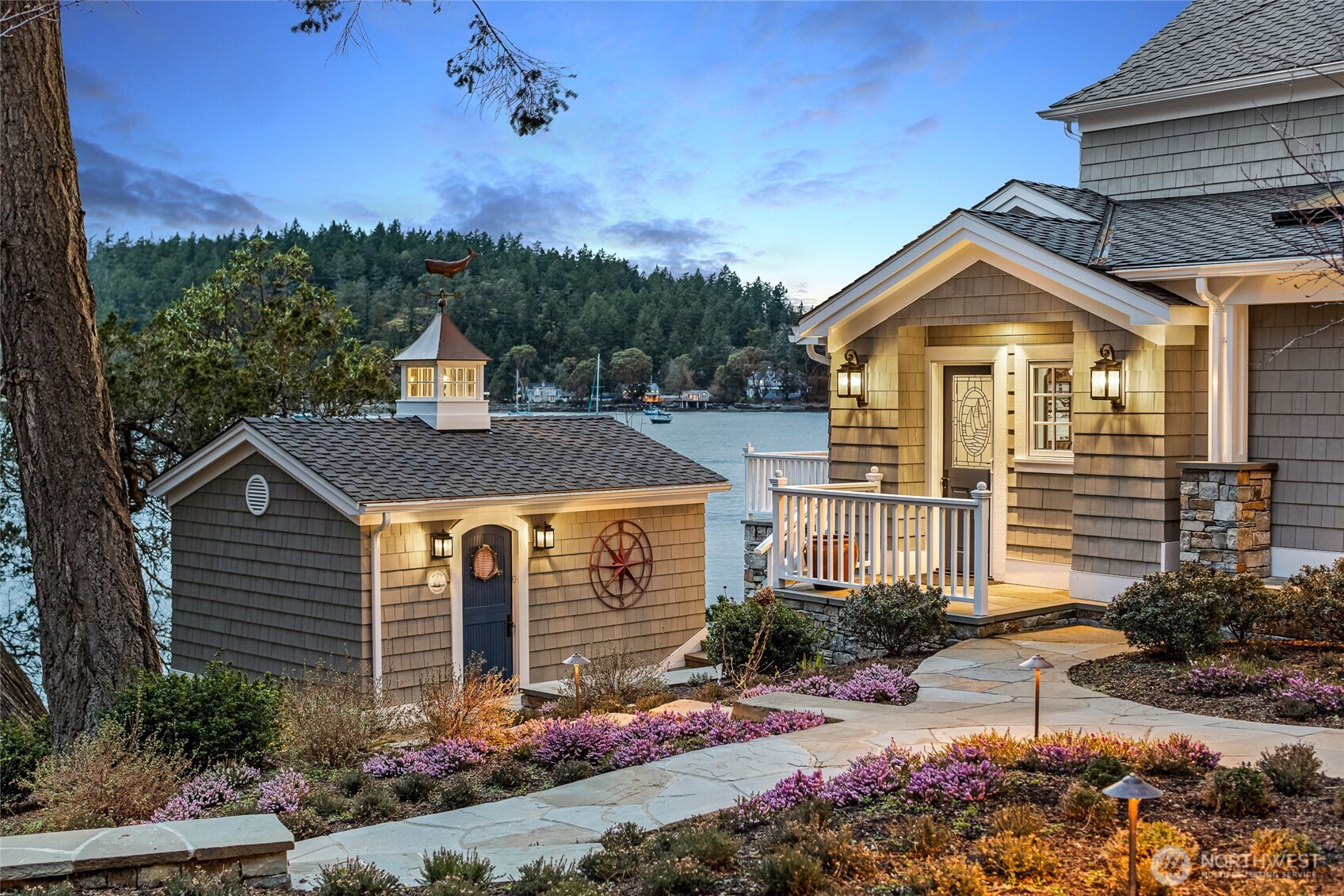 95 Laurel Point Lane Friday Harbor, WA 98250 - Photo 23 of 40 a front view of a house with a yard