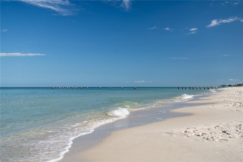 282 4th Street South, Unit 204 Naples, FL 34102 - Photo 15 of 16 a view of beach and lake