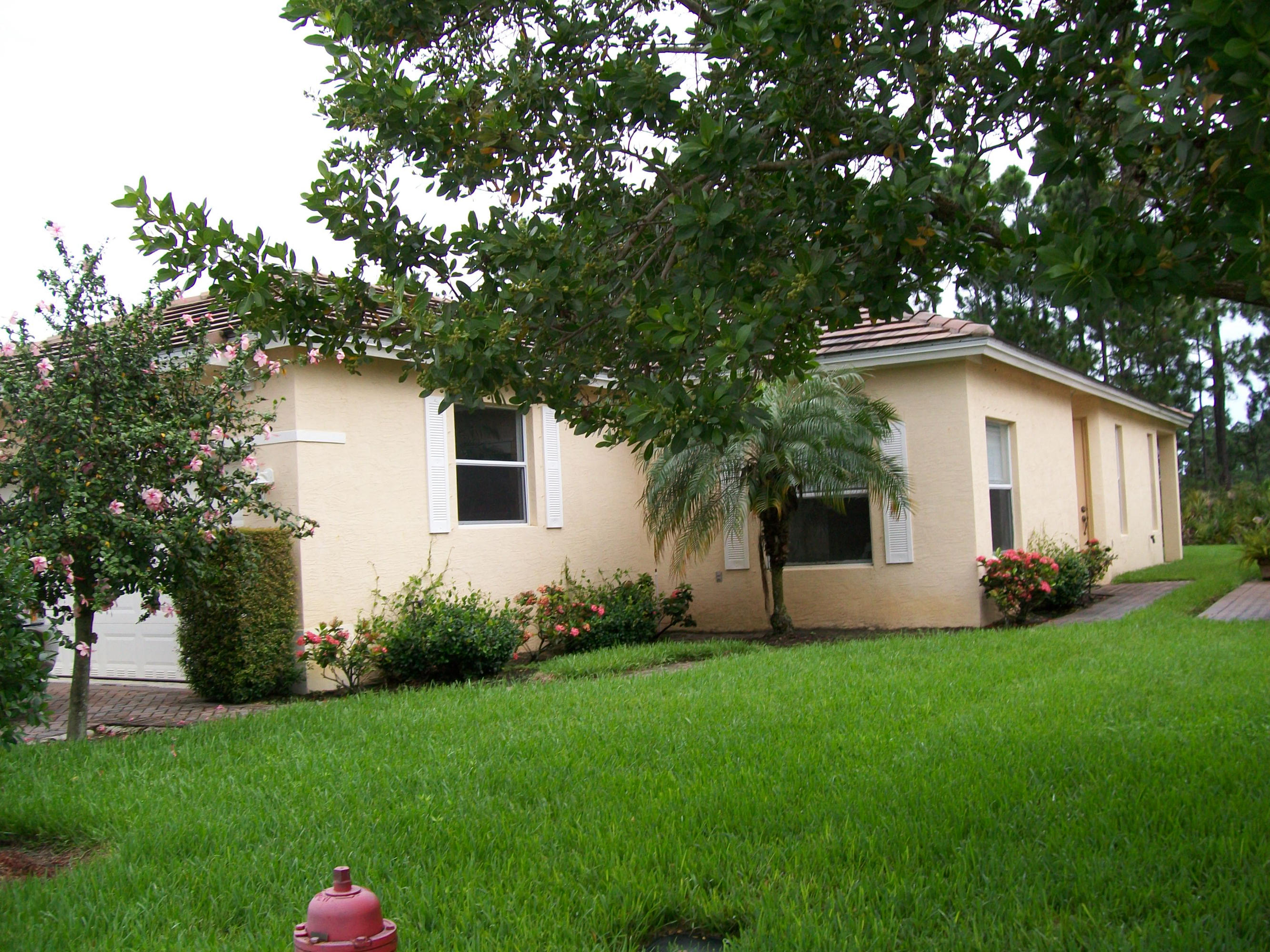 314 Southwest Maclay Way Port St. Lucie, FL 34986 - Photo 24 of 25 side of house