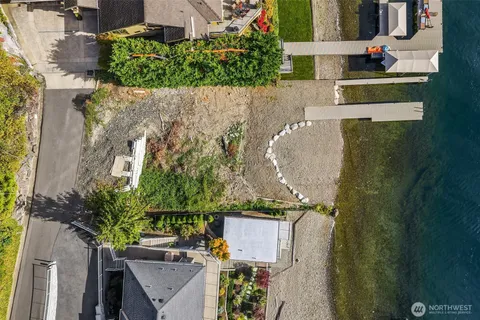 aerial view of a house with a garden