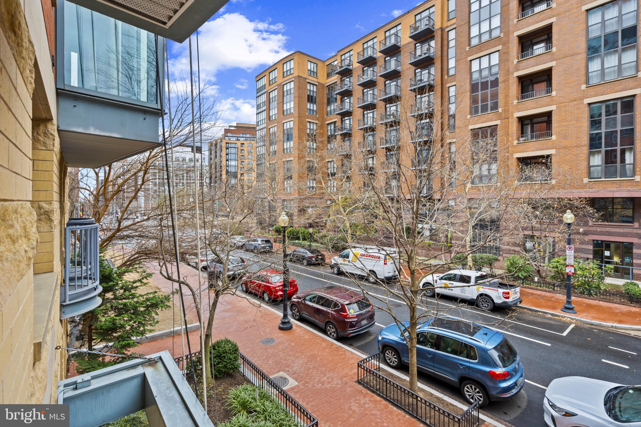 1117 10th Street Northwest, Unit 202 Washington, DC 20001 - Photo 25 of 29 a car parked in front of a building