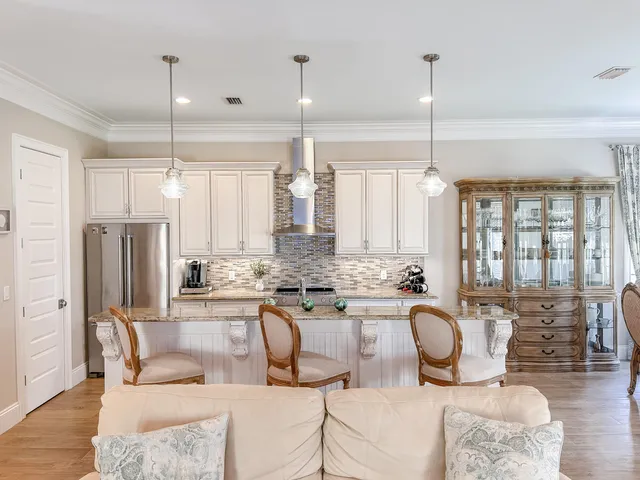 a large kitchen with granite countertop lots of counter top space