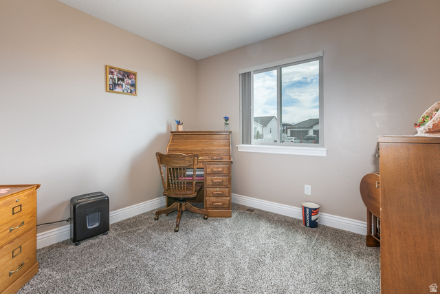1228 North Providence Way Tooele, UT 84074 - Photo 20 of 28 Neutral painted walls with a single window featuring a white sill and trim
