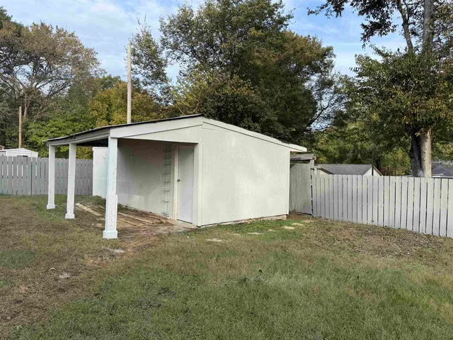 a view of a house with a garage