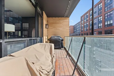 a view of a kitchen with furniture and a kitchen