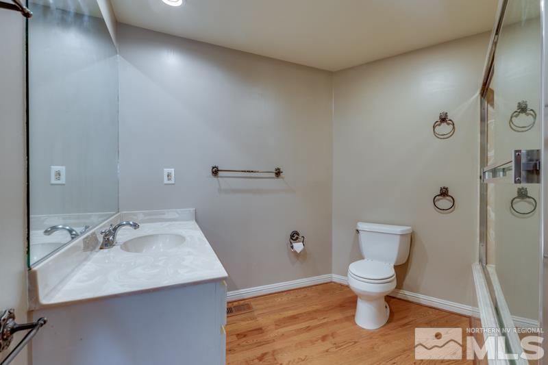 1860 Wendy Way Reno, NV 89509 - Photo 19 of 36 a bathroom with a sink toilet and shower