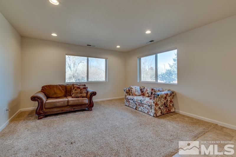 1860 Wendy Way Reno, NV 89509 - Photo 22 of 36 a living room with furniture and a window
