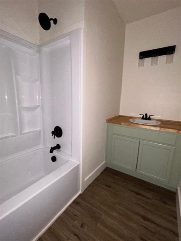 415 West Walnut Street Whitewright, TX 75491 - Photo 24 of 36 a bathroom with a bathtub and a shower