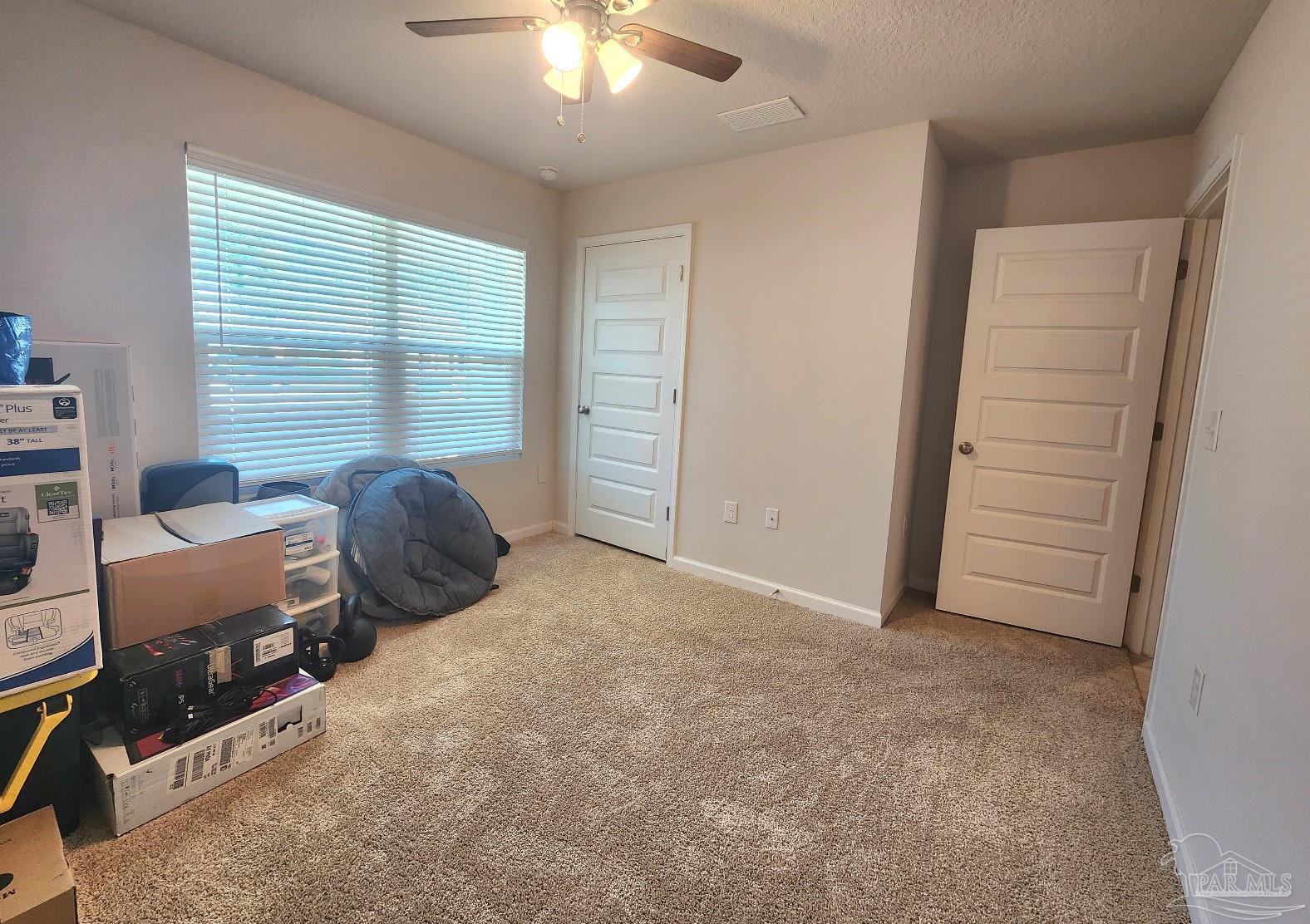 5379 Peach Drive Pace, FL 32571 - Photo 15 of 23 a view of a livingroom with a window and furniture