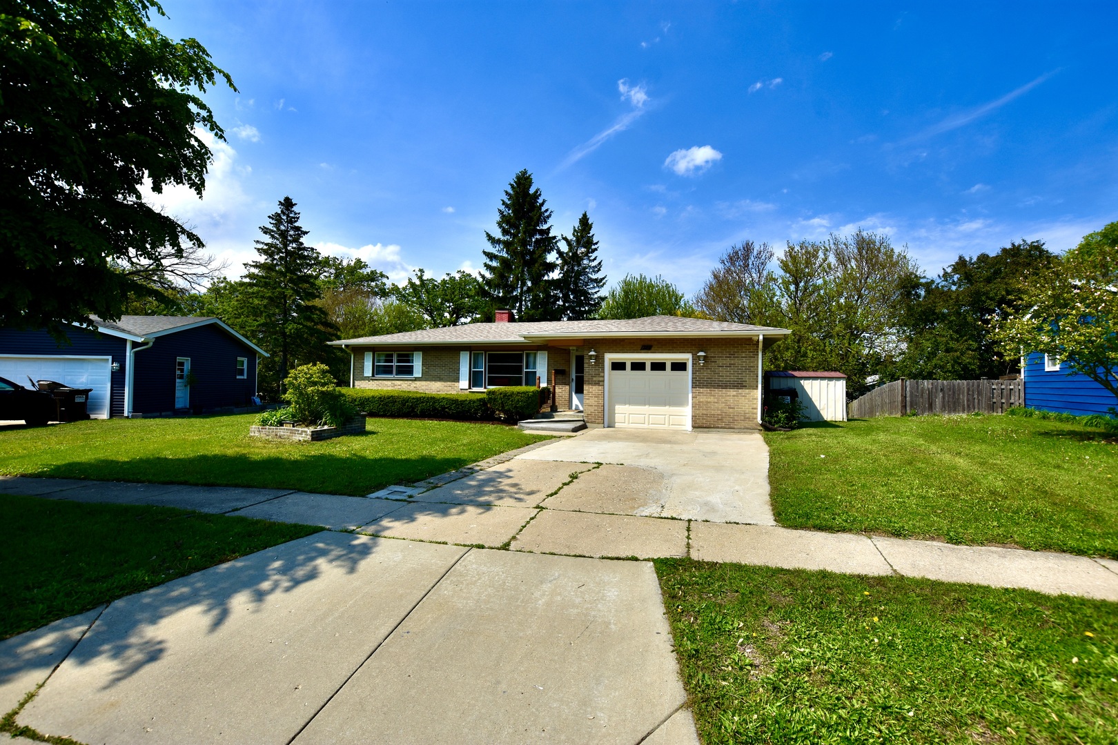 4510 Ashley Drive McHenry, IL 60050 - Photo 1 of 8 a front view of house with yard and green space