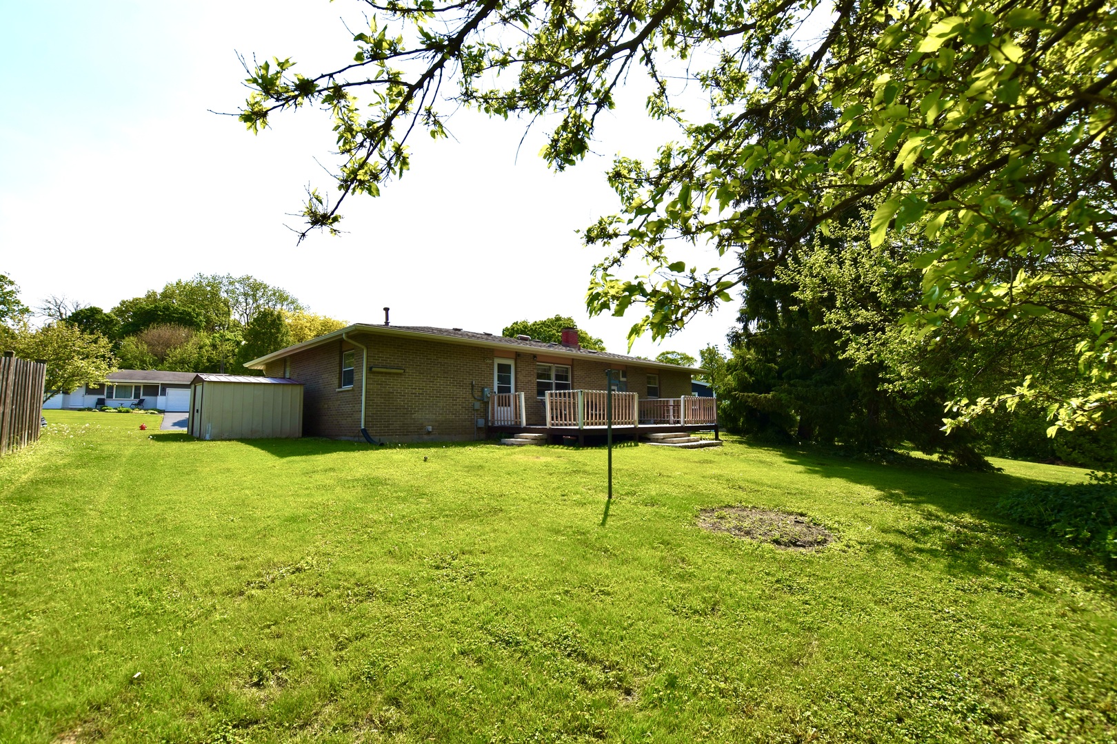 4510 Ashley Drive McHenry, IL 60050 - Photo 4 of 8 a backyard of a house with lots of green space