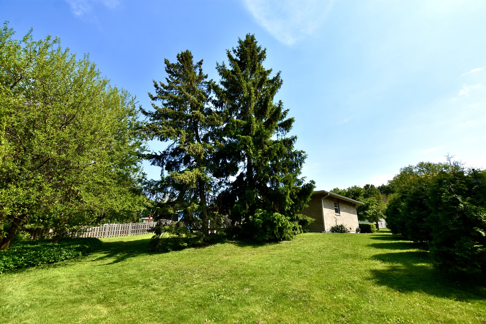 4510 Ashley Drive McHenry, IL 60050 - Photo 5 of 8 a view of a house with a yard