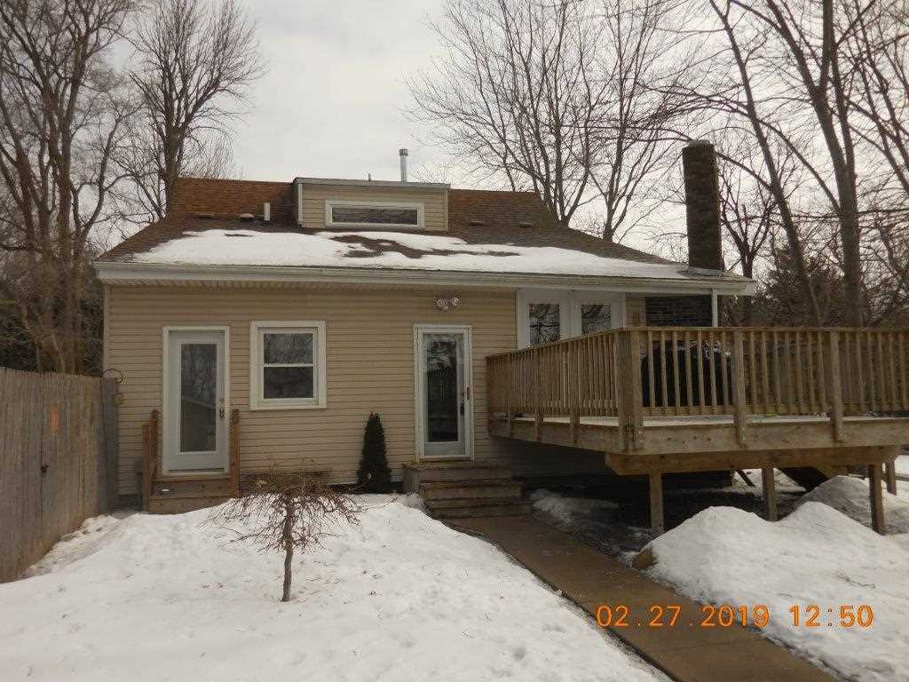 4483 Centerville Road Rockford, IL 61102 - Photo 4 of 24 a view of a house with a roof deck