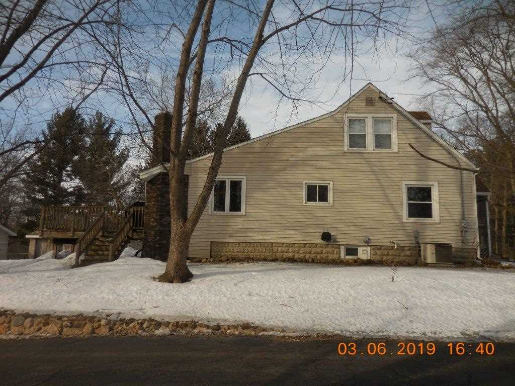 4483 Centerville Road Rockford, IL 61102 - Photo 6 of 24 a front view of a house with a yard