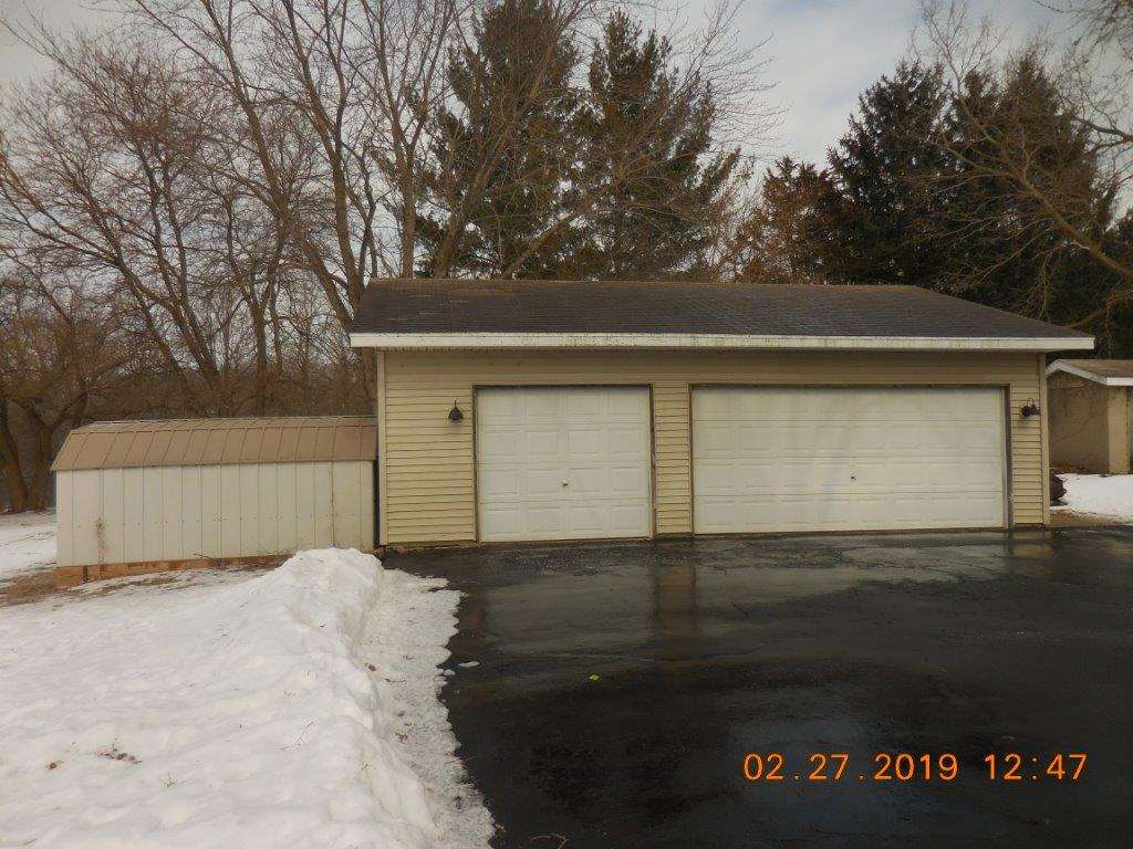 4483 Centerville Road Rockford, IL 61102 - Photo 8 of 24 a backyard of a house