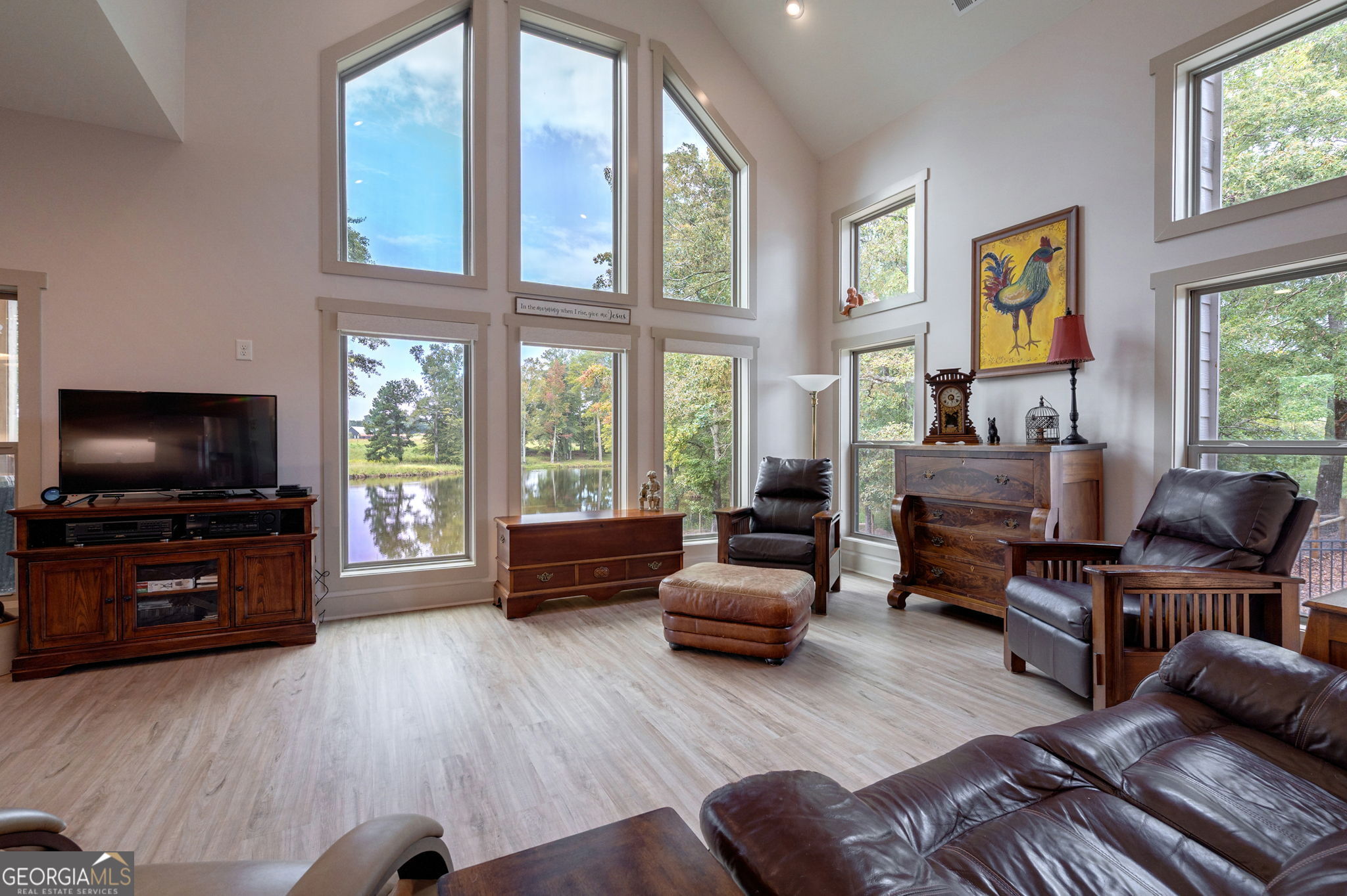 1364 Old Bishop Road Bishop, GA 30621 - Photo 29 of 62 a living room with furniture and a flat screen tv