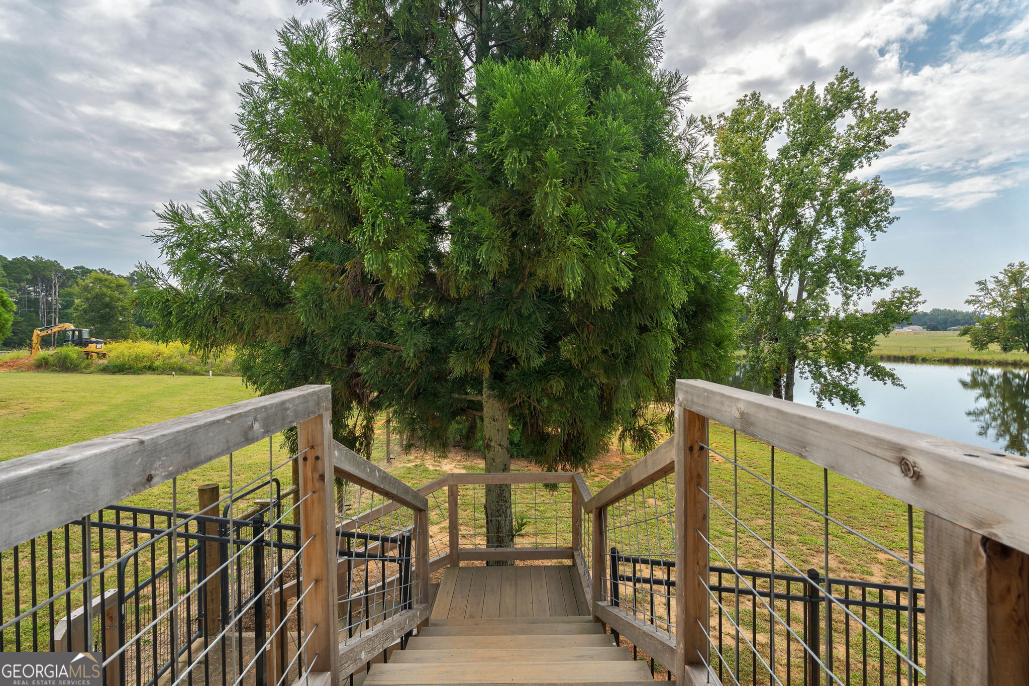 1364 Old Bishop Road Bishop, GA 30621 - Photo 37 of 62 a view of a balcony with wooden floor and fence