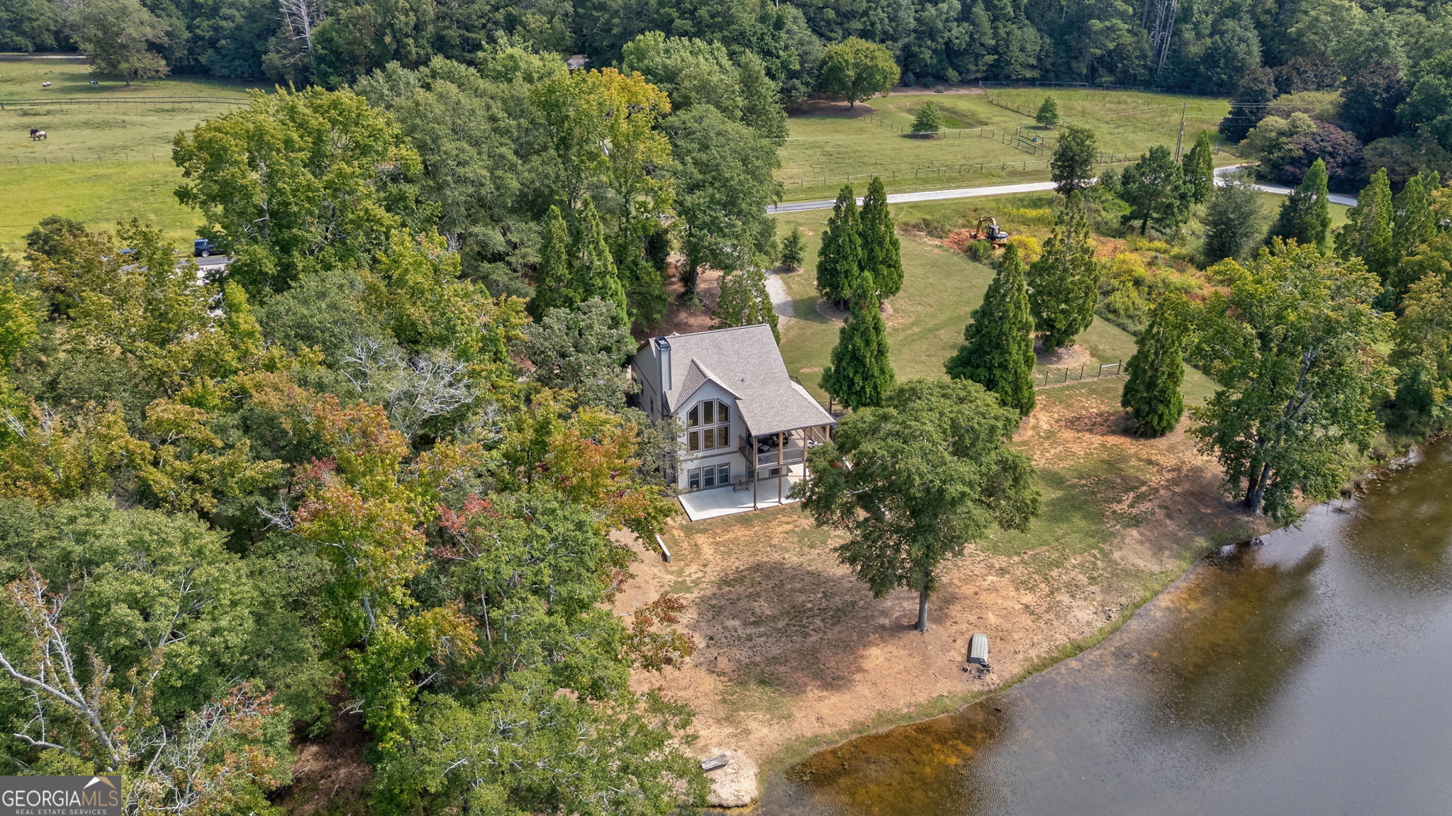 1364 Old Bishop Road Bishop, GA 30621 - Photo 53 of 62 an aerial view of a house with a yard lake and outdoor seating