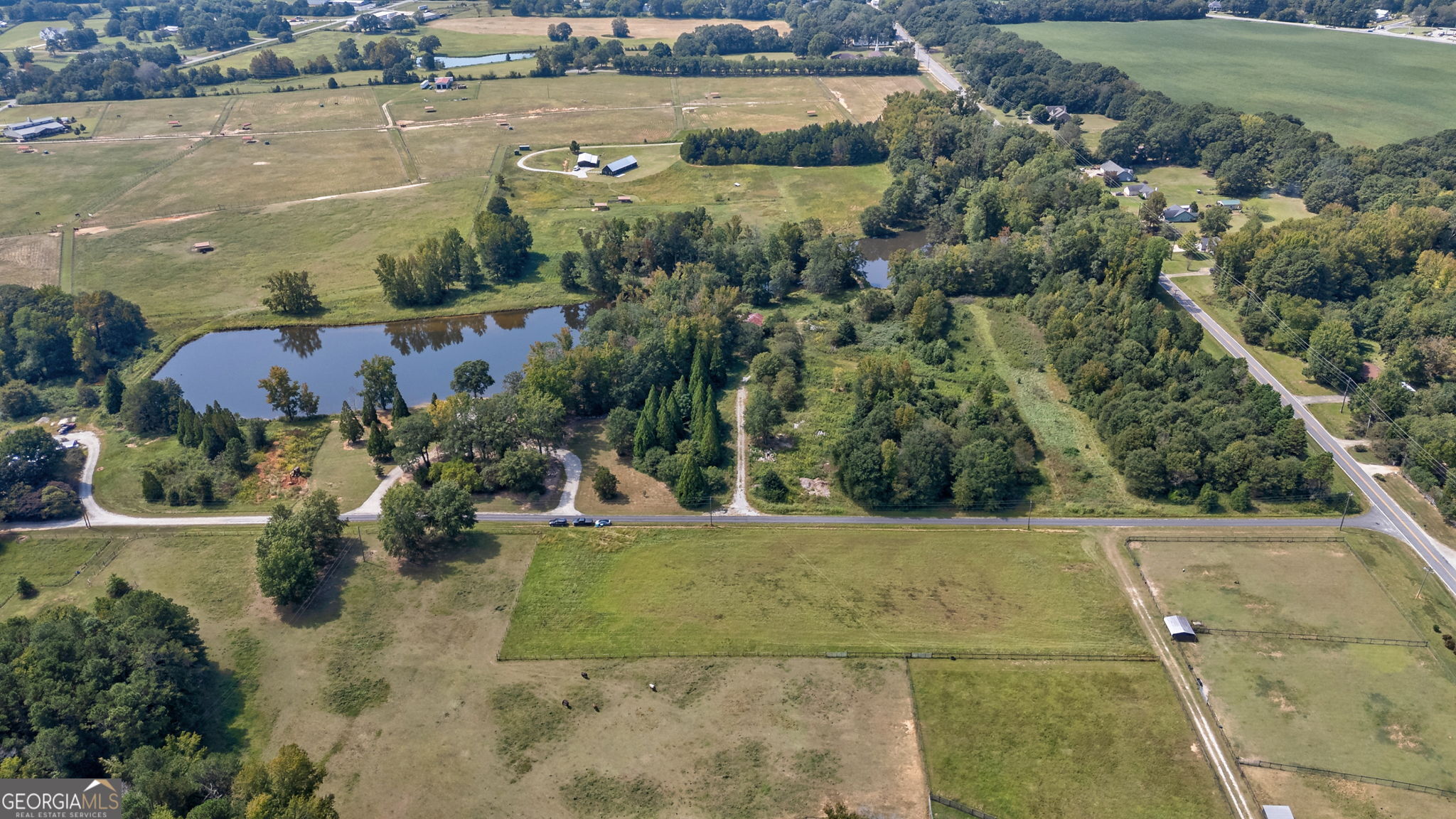 1364 Old Bishop Road Bishop, GA 30621 - Photo 57 of 62 an aerial view of a house with a lake view