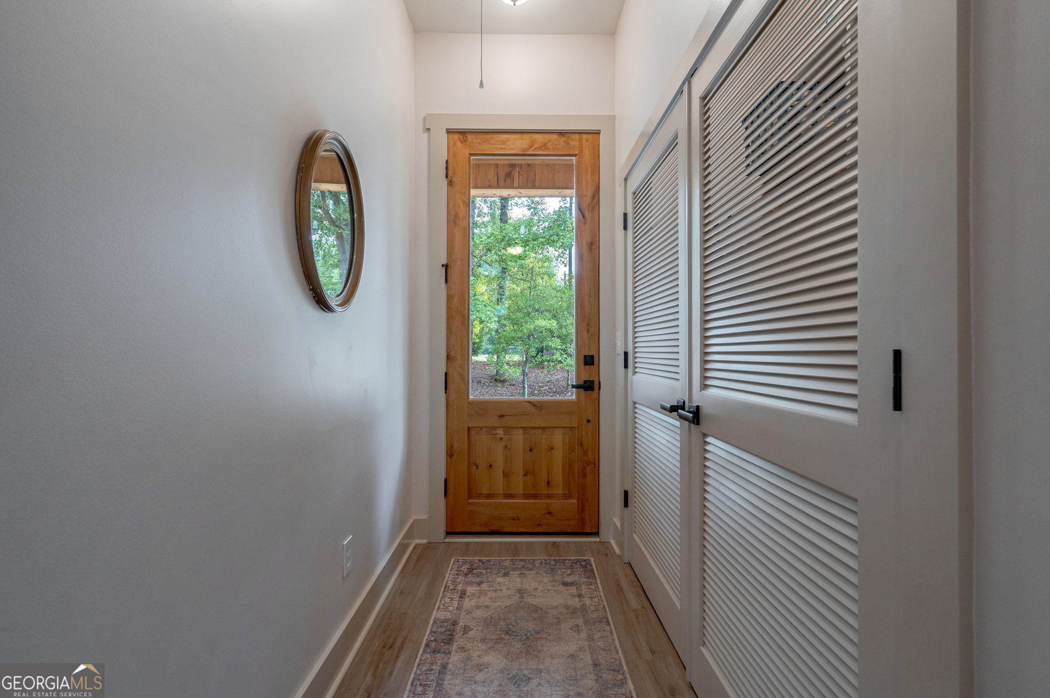 1364 Old Bishop Road Bishop, GA 30621 - Photo 10 of 62 a view of a room with wooden floor and windows