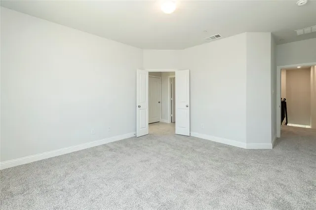 an empty room with a natural light