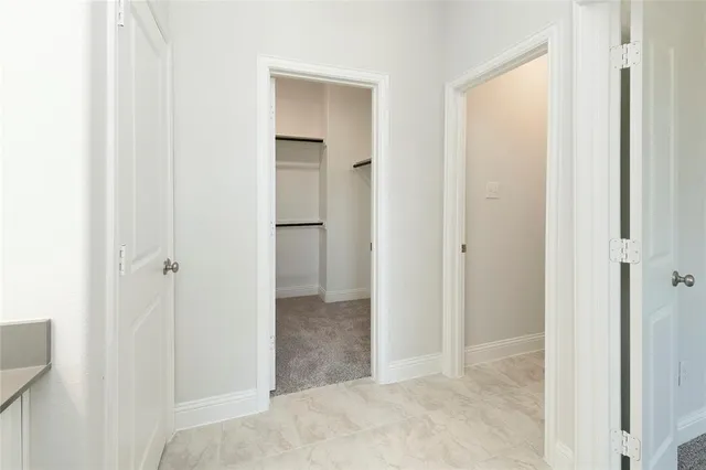 a bathroom with a sink vanity and a mirror