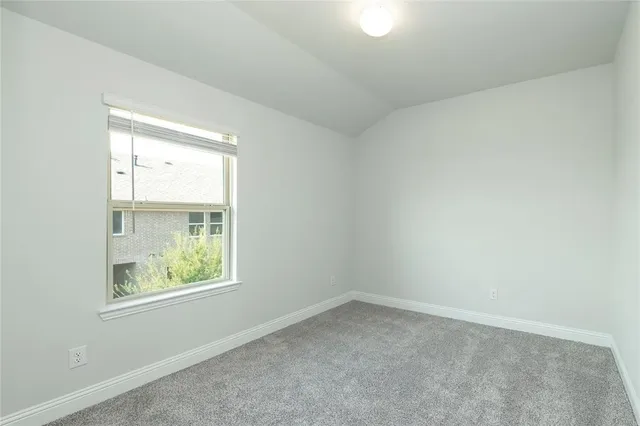 a view of a kitchen cabinets and a stove top oven