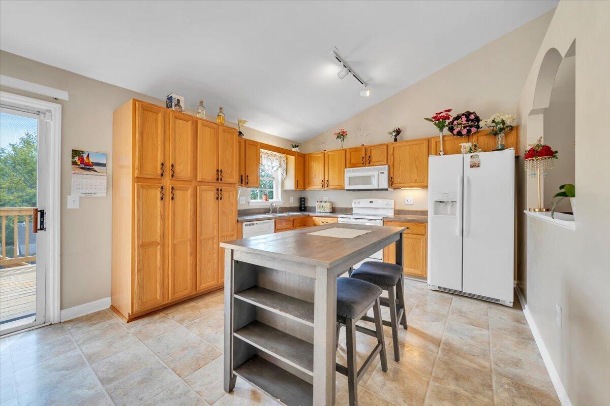 4751 Westvale Road Northeast Roanoke, VA 24019 - Photo 8 of 30 a kitchen with stainless steel appliances granite countertop a refrigerator and a stove top oven