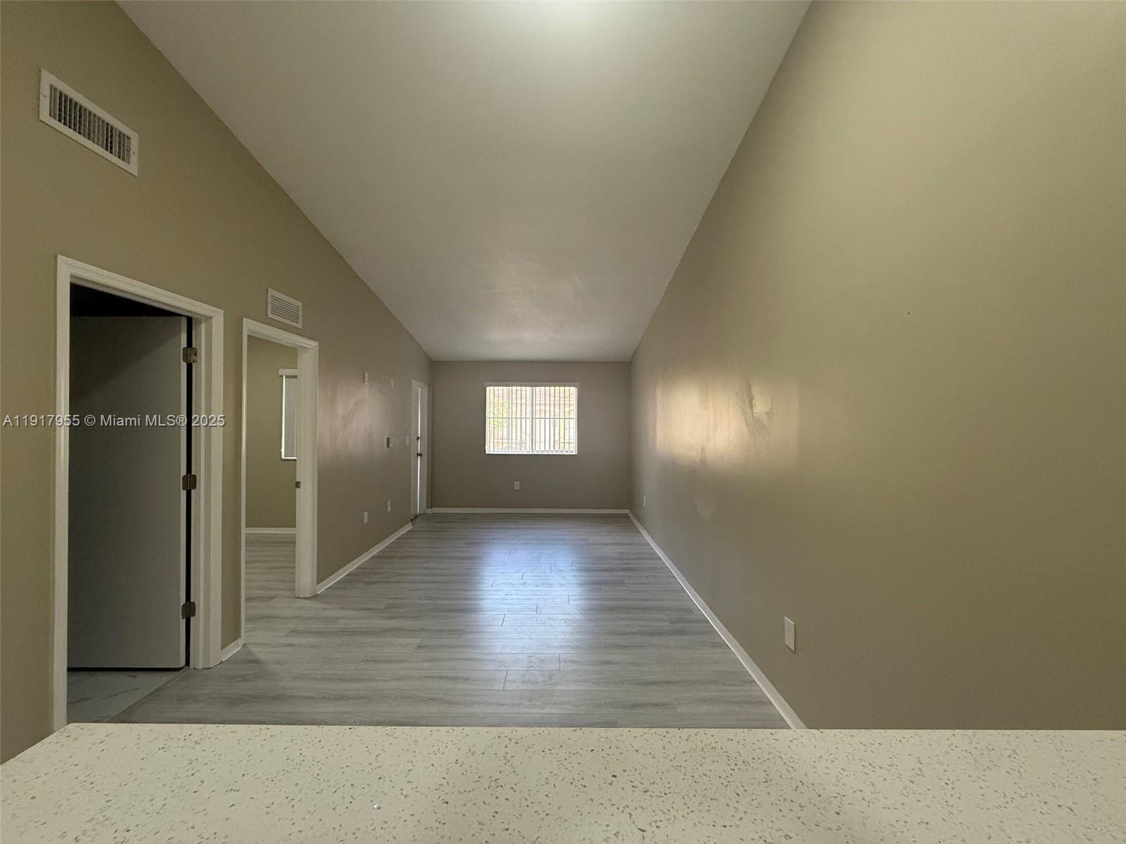 2911 Southeast 13th Road, Unit 20240 Homestead, FL 33035 - Photo 27 of 28 a view of wooden floor