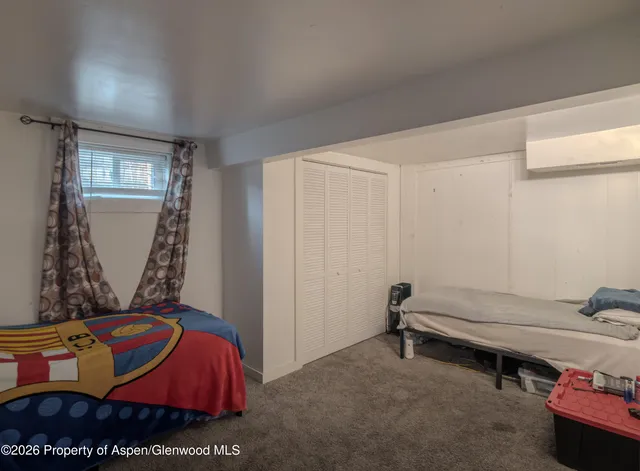 a room with furniture and a window