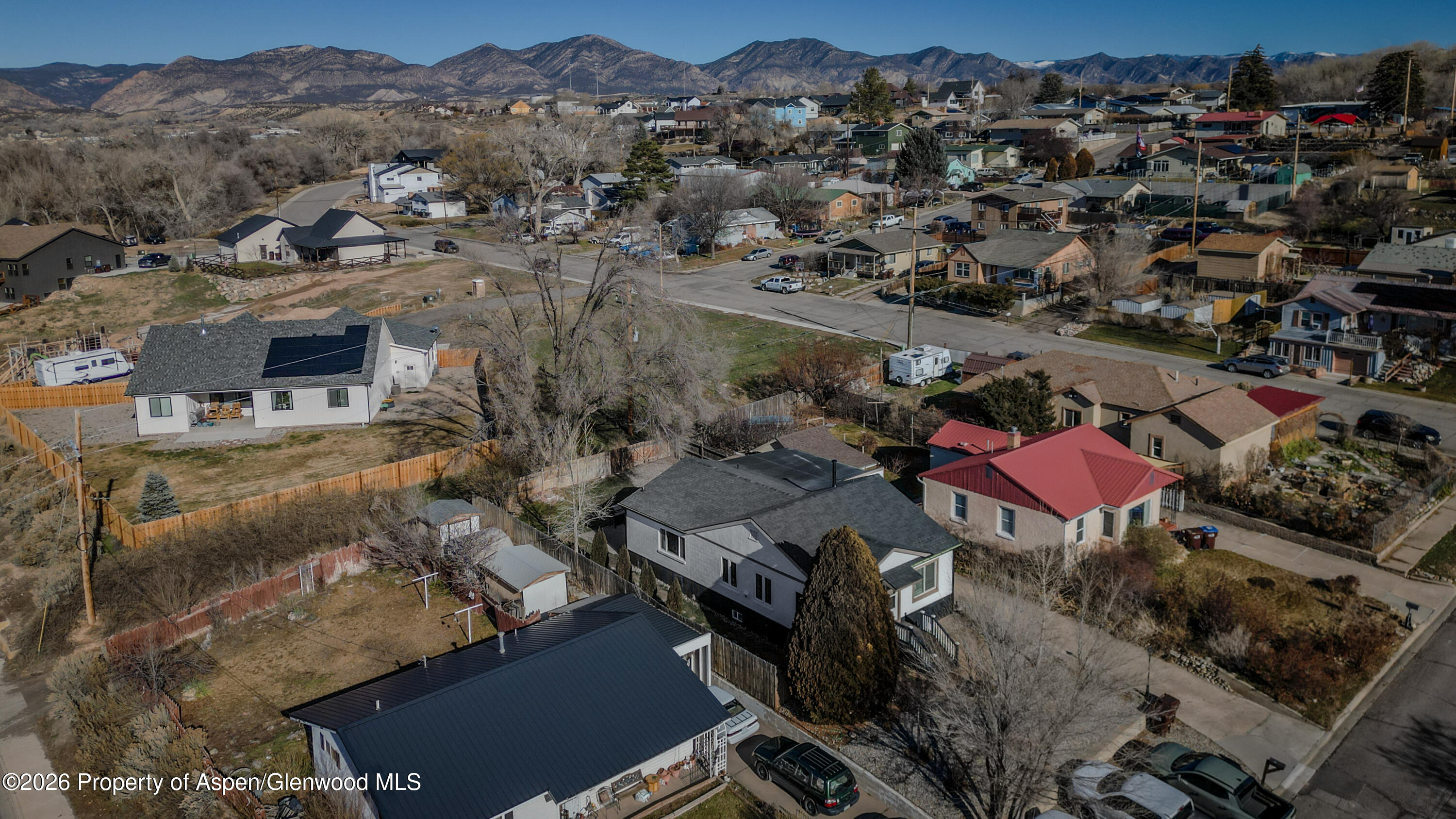 326 East 10th Street Rifle, CO 81650 - Photo 36 of 39 an aerial view of a city with lots of residential buildings