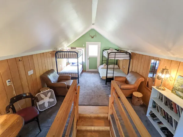 a room with furniture and a window