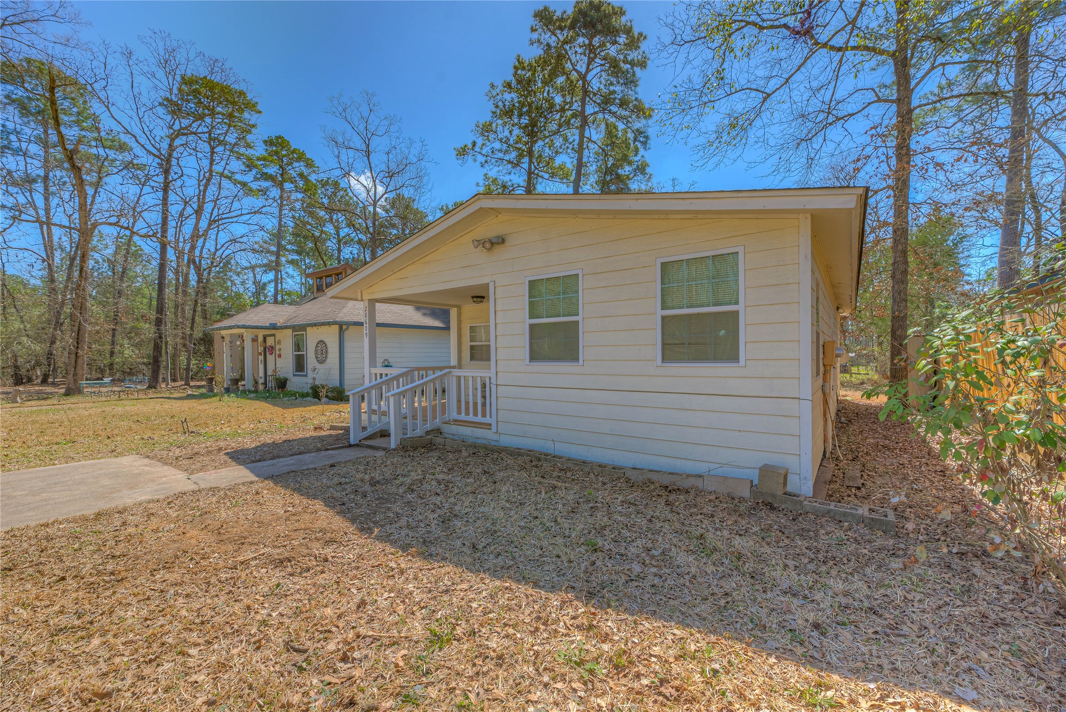 28609 Netawake Court Point Blank, TX 77364 - Photo 20 of 32 a view of a house with a yard