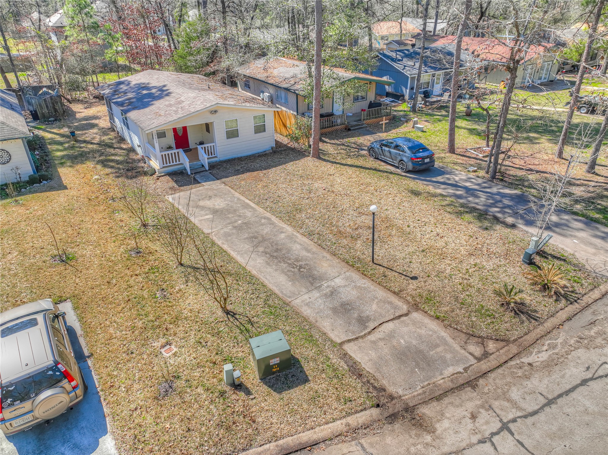 28609 Netawake Court Point Blank, TX 77364 - Photo 23 of 32 a view of a street with cars
