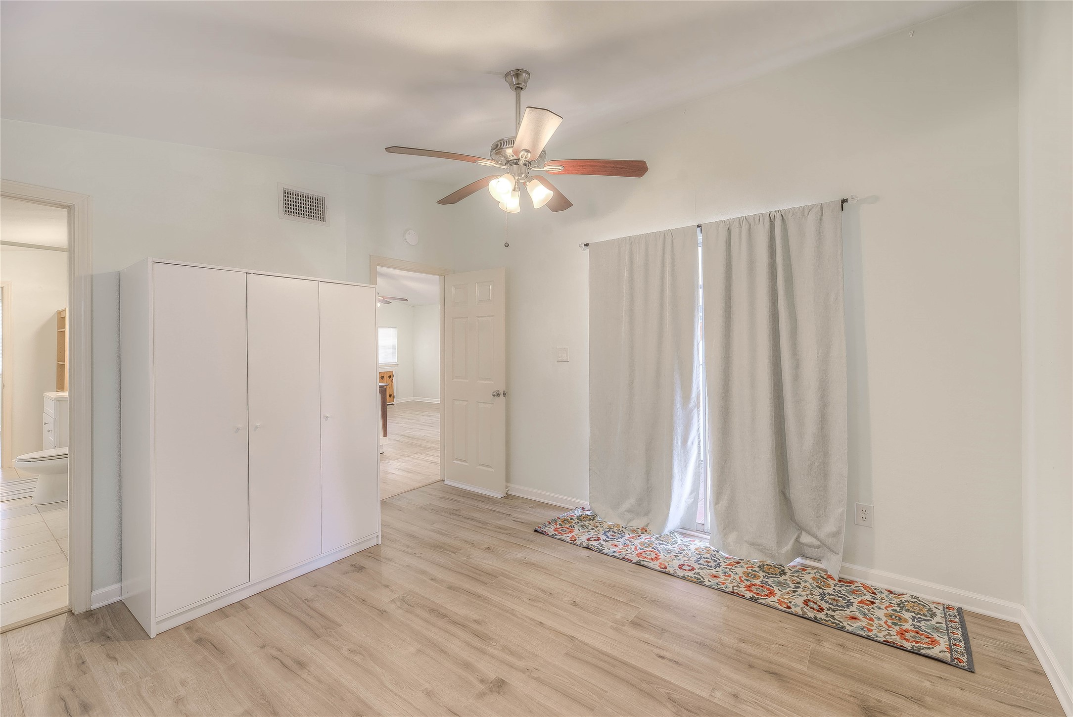 28609 Netawake Court Point Blank, TX 77364 - Photo 8 of 32 a view of empty room with wooden floor