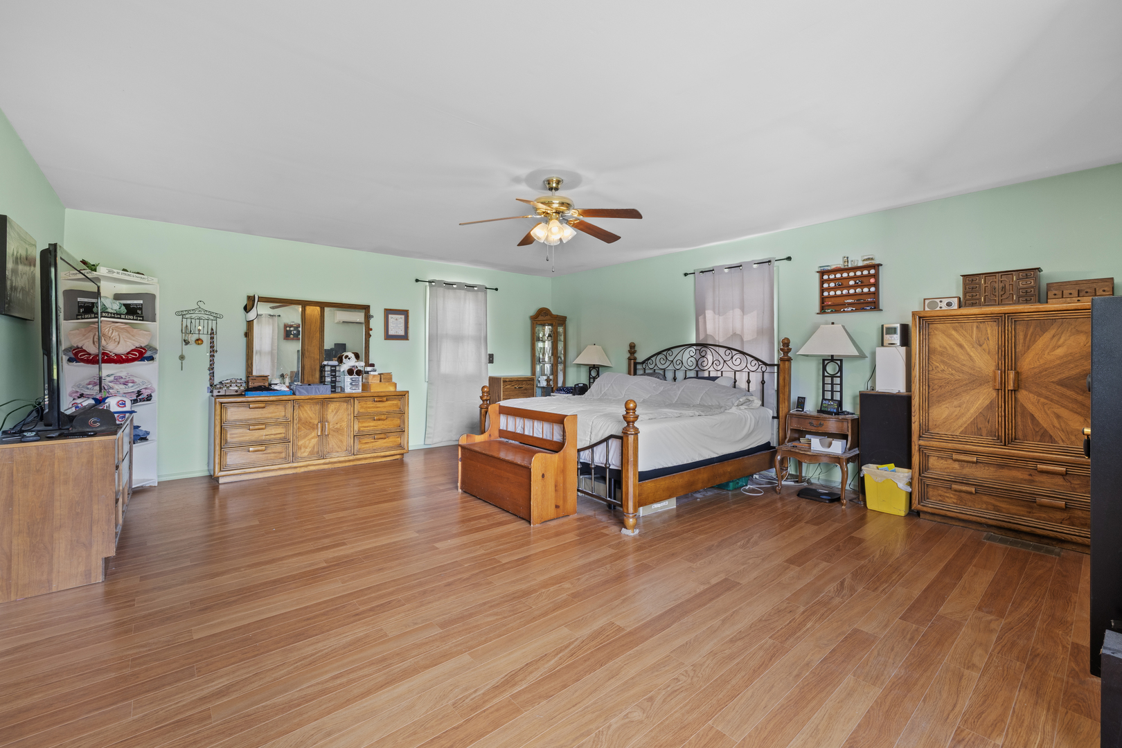 4 Saugatuck Road Montgomery, IL 60538 - Photo 17 of 24 a bedroom with furniture and wooden floor