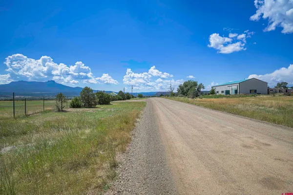 a view of a lake with a city view