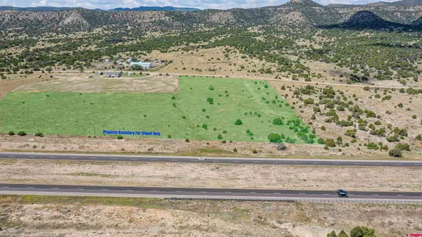 a view of swimming pool from a balcony