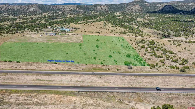 a view of swimming pool from a balcony