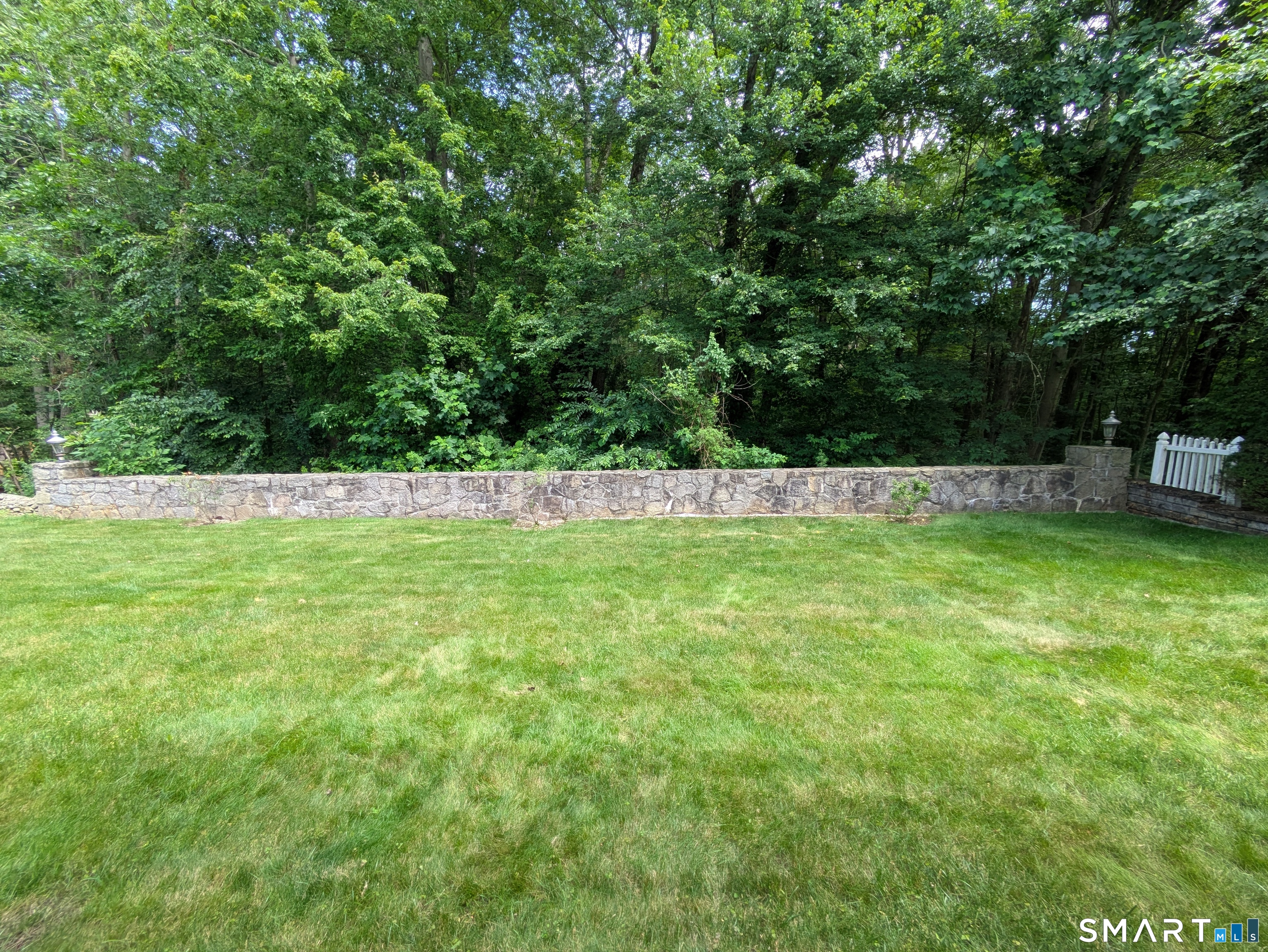 61 Basking Brook Road Shelton, CT 06484 - Photo 3 of 25 a view of garden with trees