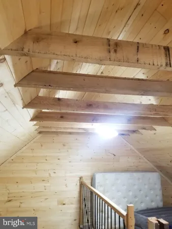 a view of balcony with wooden floor